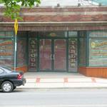 Elaborate window lettering for a shop in Watertown